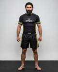 Ensemble TYCE 7 Guerriers Leonidas - rashguard et short noirs a grecque doree - vue de face